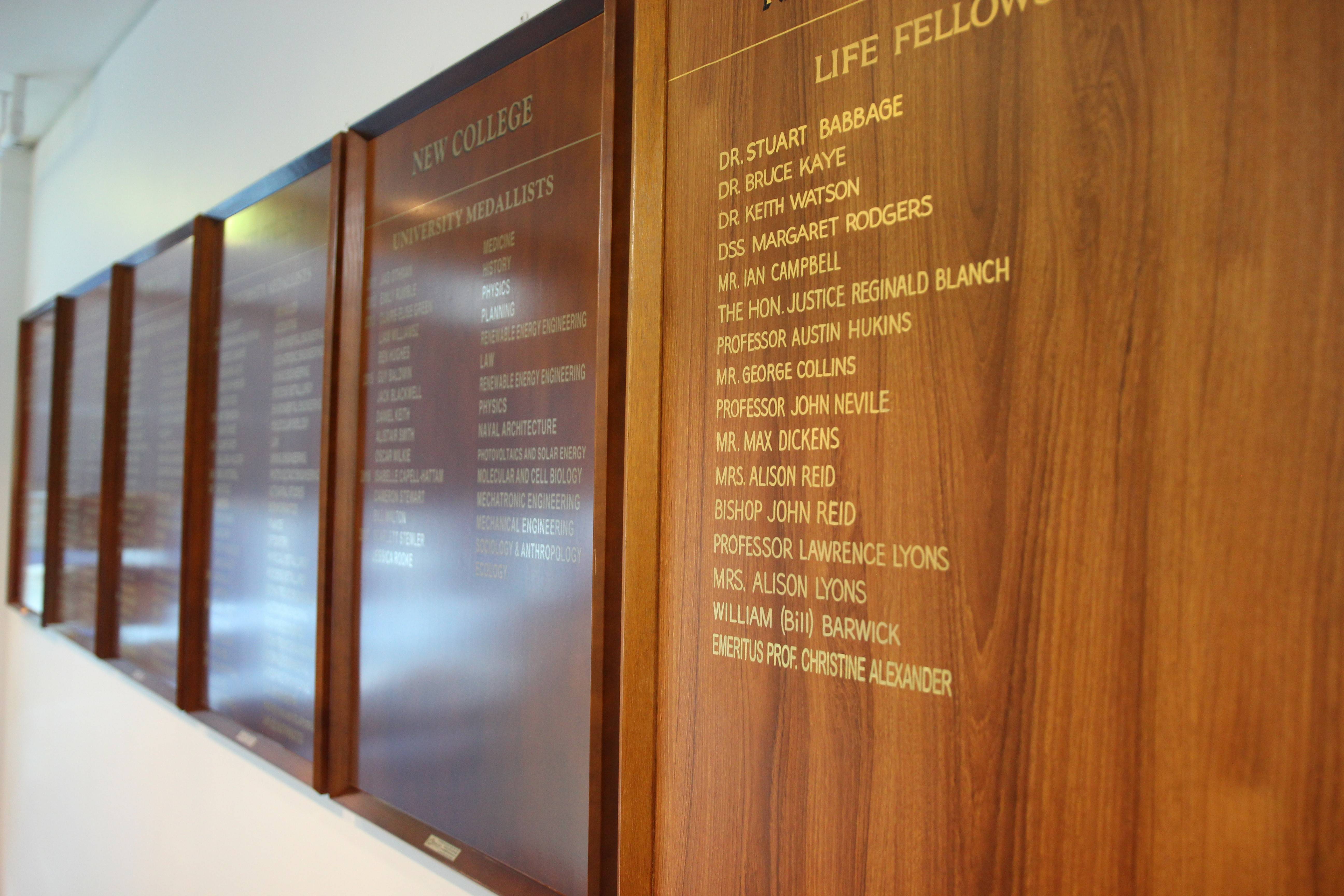 Photograph of New College Honour Boards highlighting achievements of past residents